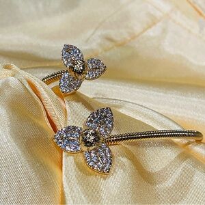Gold Tone Floral Crystal Bangle Bracelet – Elegant Sparkling Flower Design